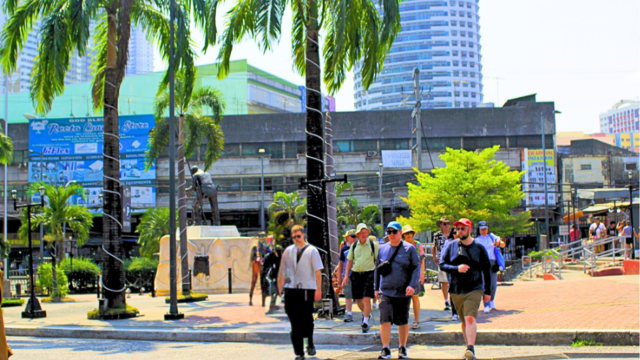 Tourists at Bonifacio Monument