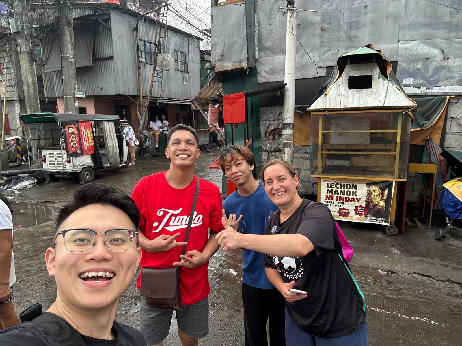 Ryan guiding international visitors on a Tondo walking tour in Manila