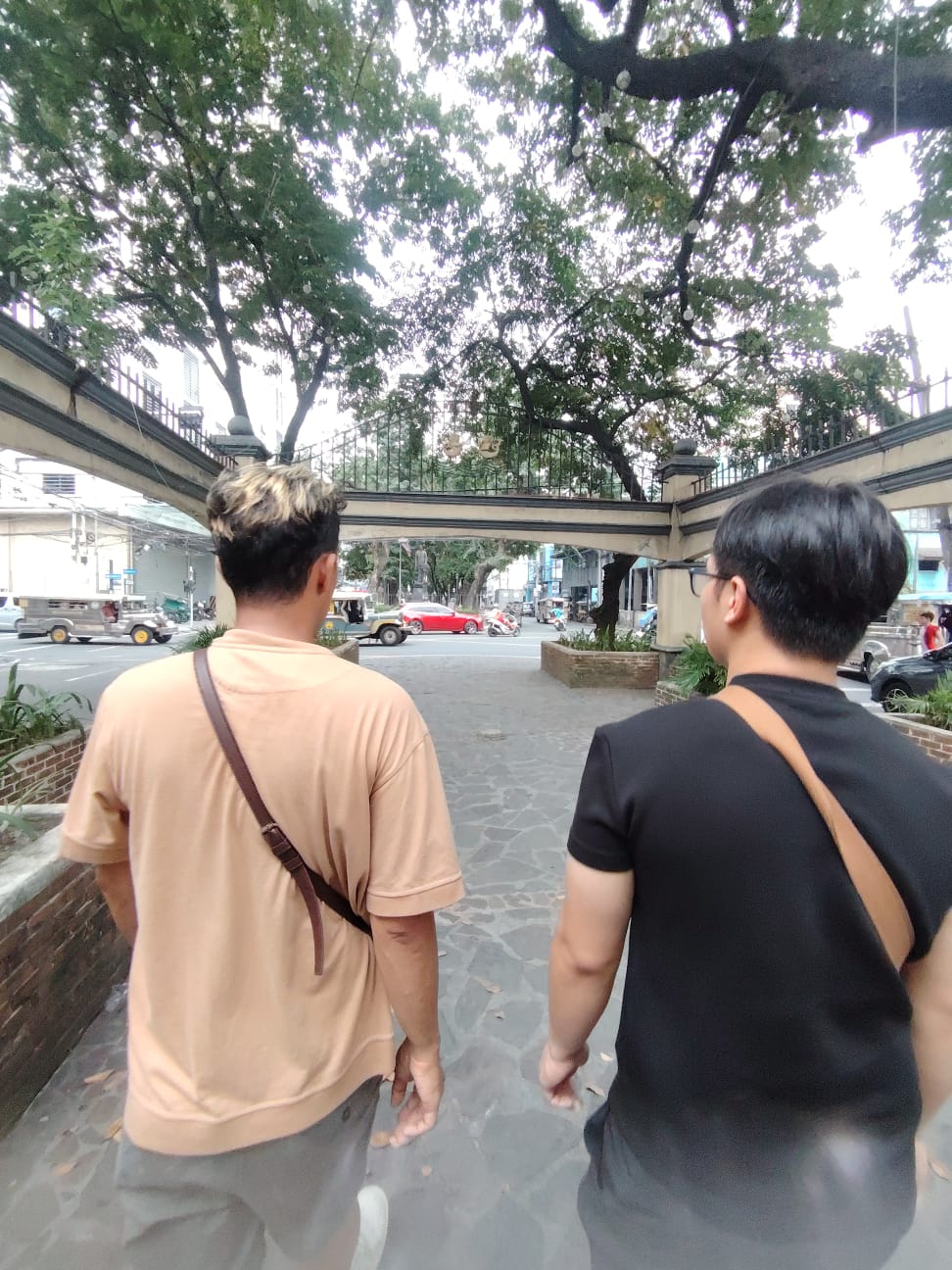 Ryan guiding international visitors on a Tondo walking tour in Manila
